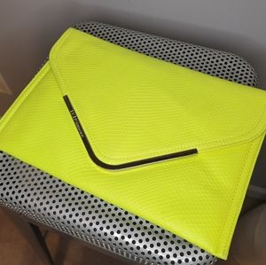 BCBG neon yellow clutch with silver detail.